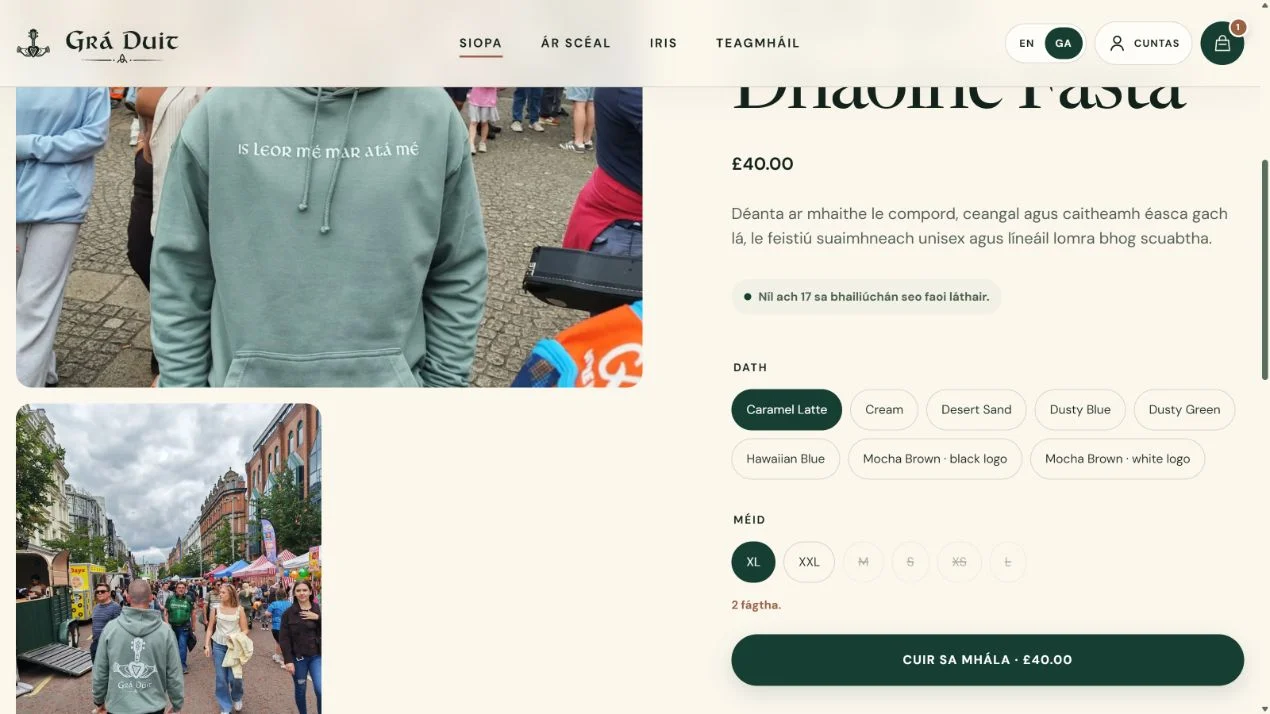 The same adult hoodie product journey in Irish, with Dath and Méid selectors